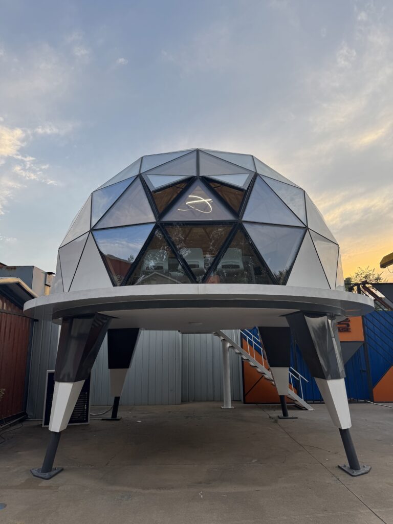 bahria homes House C7 Plus futuristic dome-shaped smart pod with glass panels and elevated design, showcasing modern architecture and innovation by bahria homes Castle.