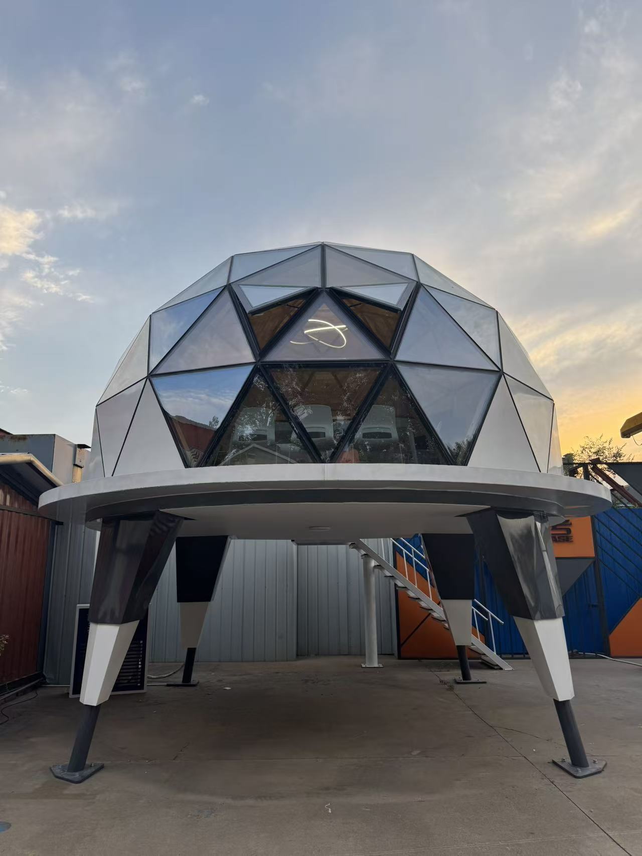 Elevated bahria homes House C7 Plus geodesic dome with glass panels and triangular framework, highlighting innovative modular architecture by bahria homes Castle.
